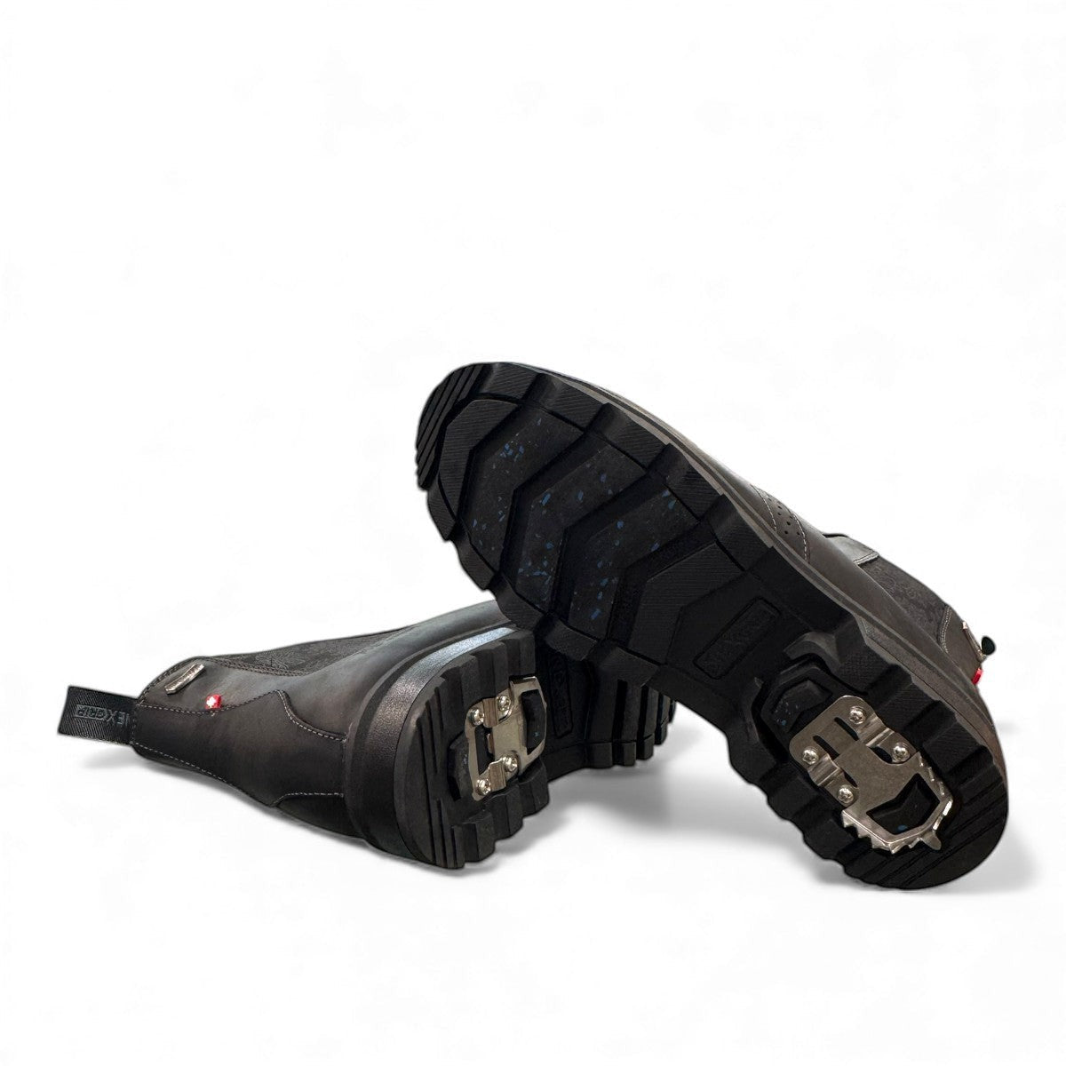 NEXGRIP ICE STELLA 6.0 all black waterproof leather winter boot with floral elastic side panel.
photo of the bottom side