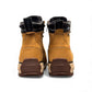 Nexgrip Ice Stone wheat waterproof leather winter boot with retractable cleats and black lace-up detail.
photo of the back side