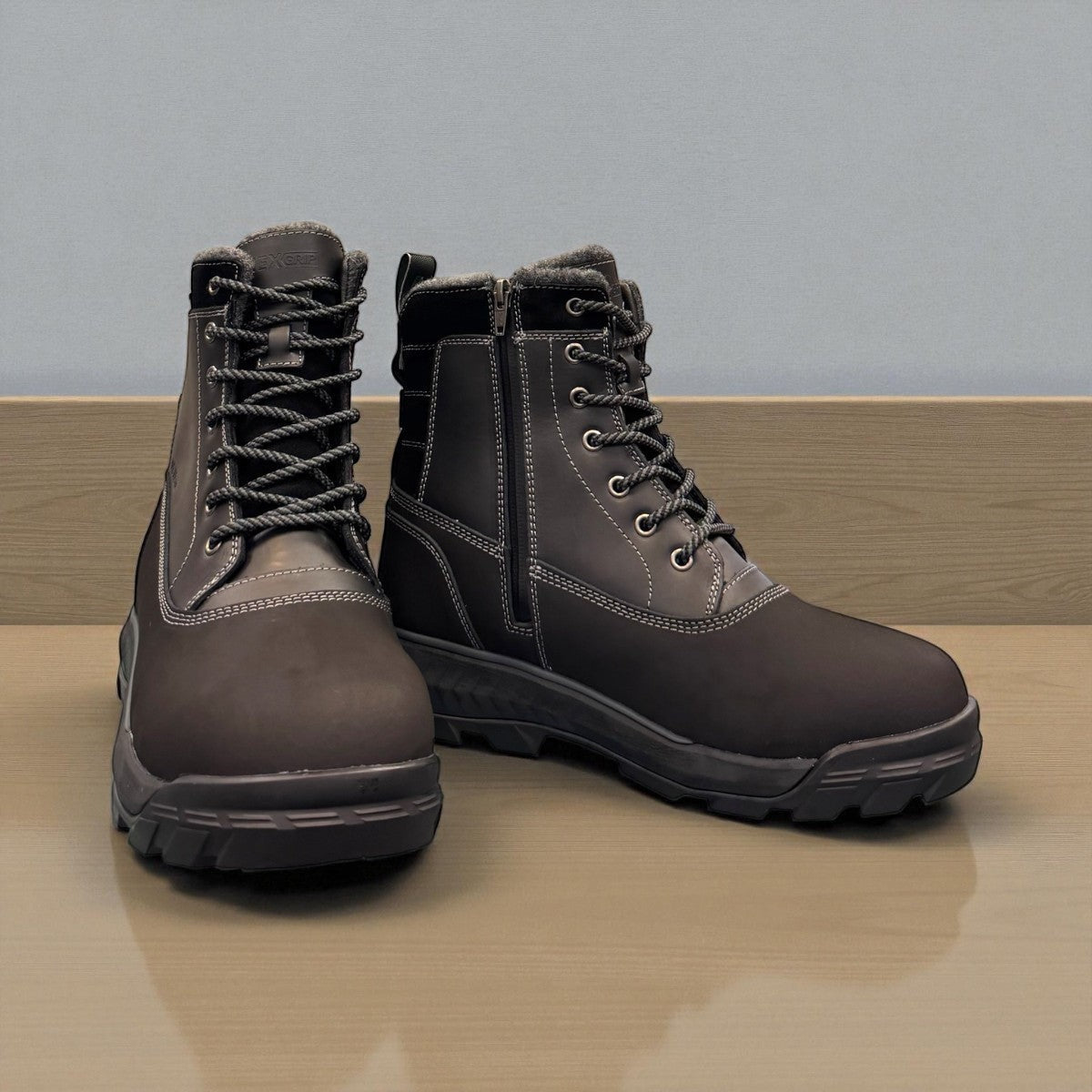 NEXGRIP Ice Victor black waterproof winter boots with retractable cleats and insulated leather design.
photo of the front side