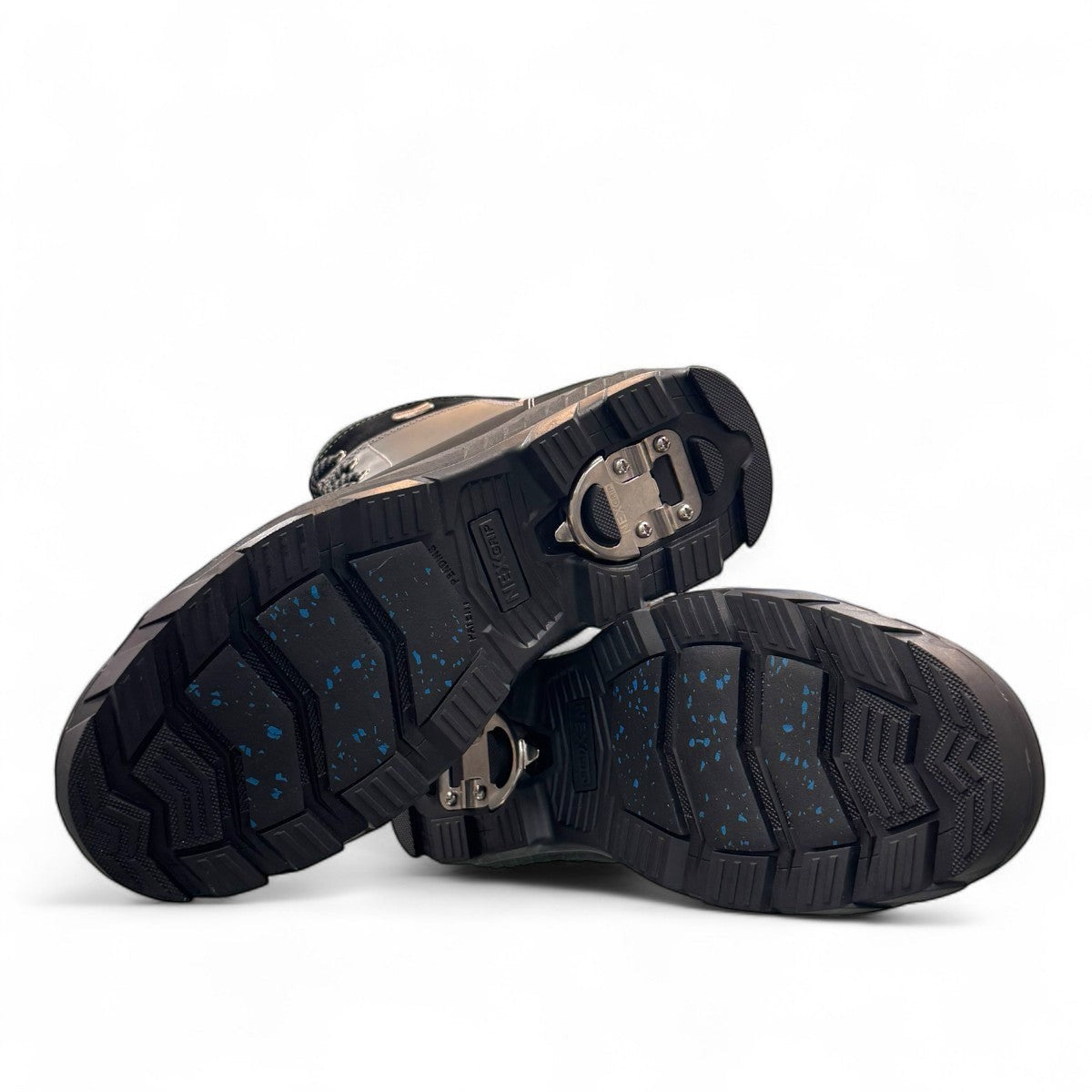 NEXGRIP Ice Victor black waterproof winter boots with retractable cleats and insulated leather design.
photo of the bottom side