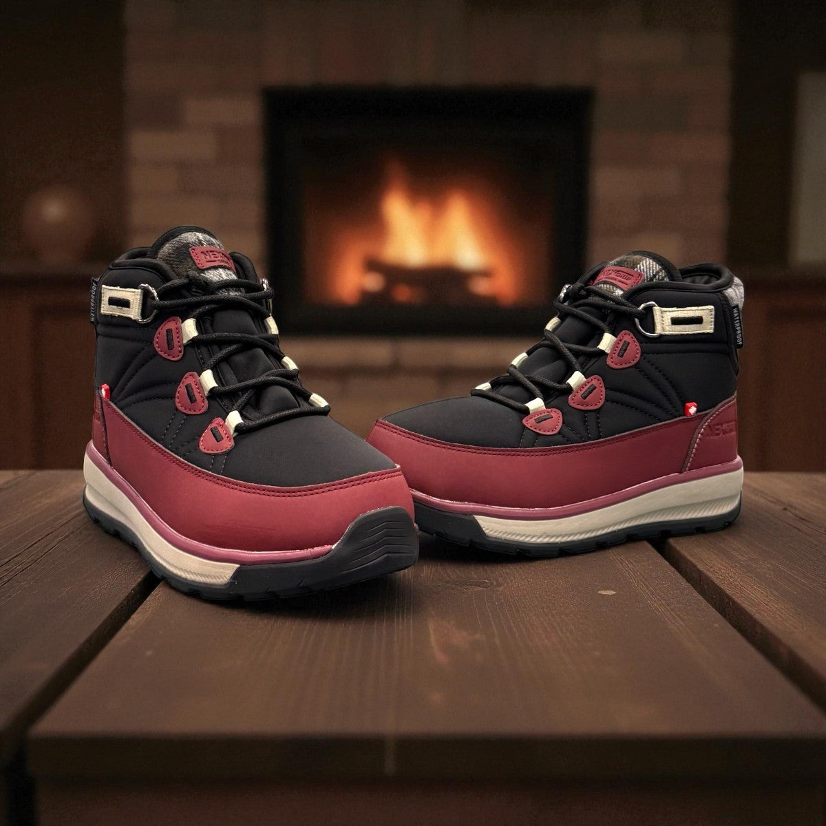 burgundy and black NexGrip Ice Wonder mid-cut waterproof winter boot with plaid collar detail. 
photo of the front side