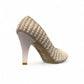Nikpa Belle silver women's pumps featuring pearl and rhinestone embellishments on a reflective surface.