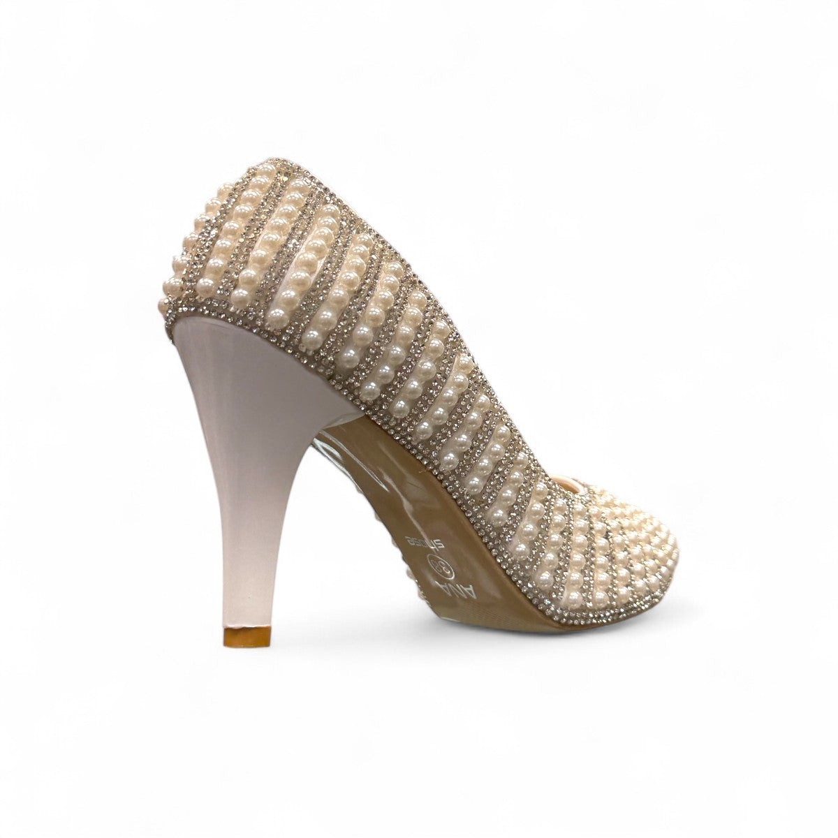 Nikpa Belle silver women's pumps featuring pearl and rhinestone embellishments on a reflective surface.