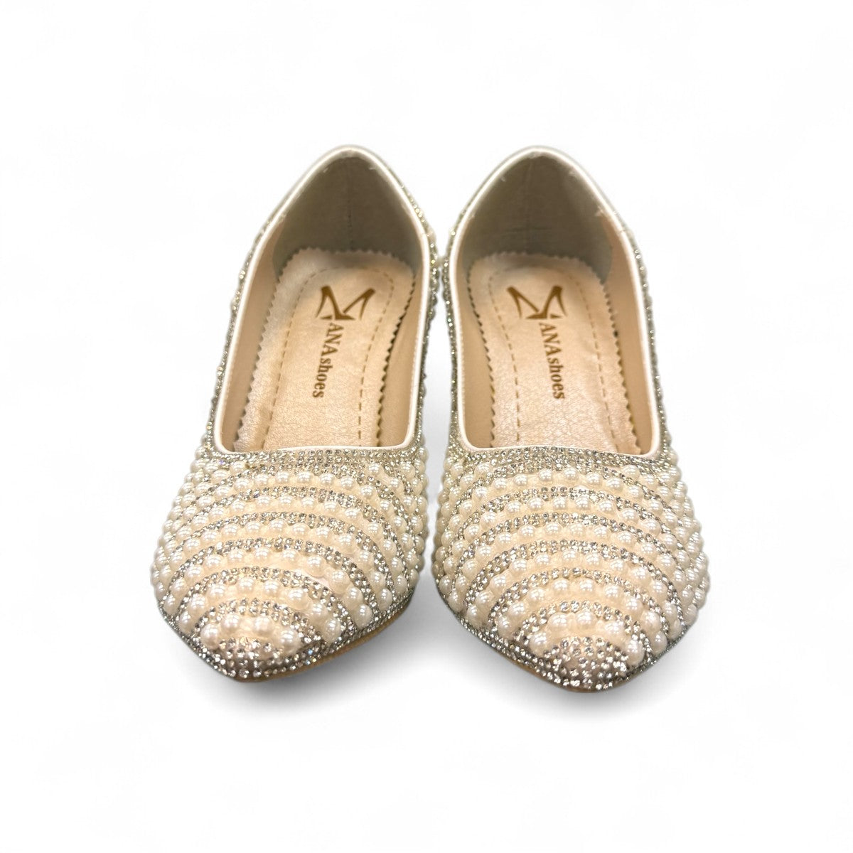 Nikpa Belle silver women's pumps featuring pearl and rhinestone embellishments on a reflective surface.