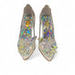NIKPA BIRILIANT white high heel pump with clear side panels and a large crystal flower embellishment