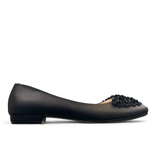Nikpa black synthetic ballet flat with handmade floral embellishment on the toe