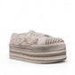 NIKPA DIBA white bridal platform sneaker with floral lace, pearl embellishments, and crystal trim.
