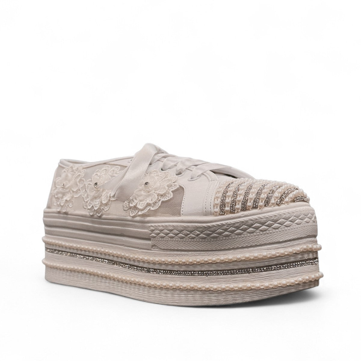 NIKPA DIBA white bridal platform sneaker with floral lace, pearl embellishments, and crystal trim.