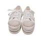 NIKPA DIBA white bridal platform sneaker with floral lace, pearl embellishments, and crystal trim.