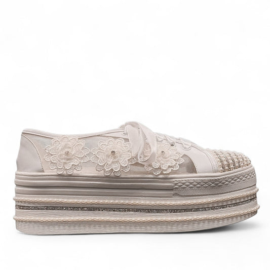 NIKPA DIBA white bridal platform sneaker with floral lace, pearl embellishments, and crystal trim.
