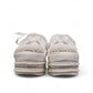 NIKPA DIBA white bridal platform sneaker with floral lace, pearl embellishments, and crystal trim.