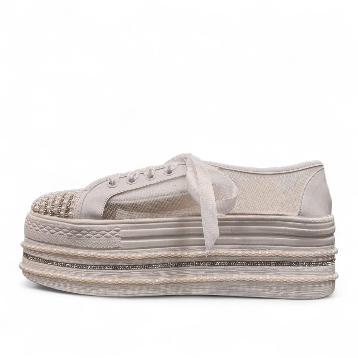 NIKPA DIBA white bridal platform sneaker with floral lace, pearl embellishments, and crystal trim.
