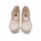 NIKPA FOXY white bridal block heel shoe with handmade floral lace, pearl embellishments, and platform.