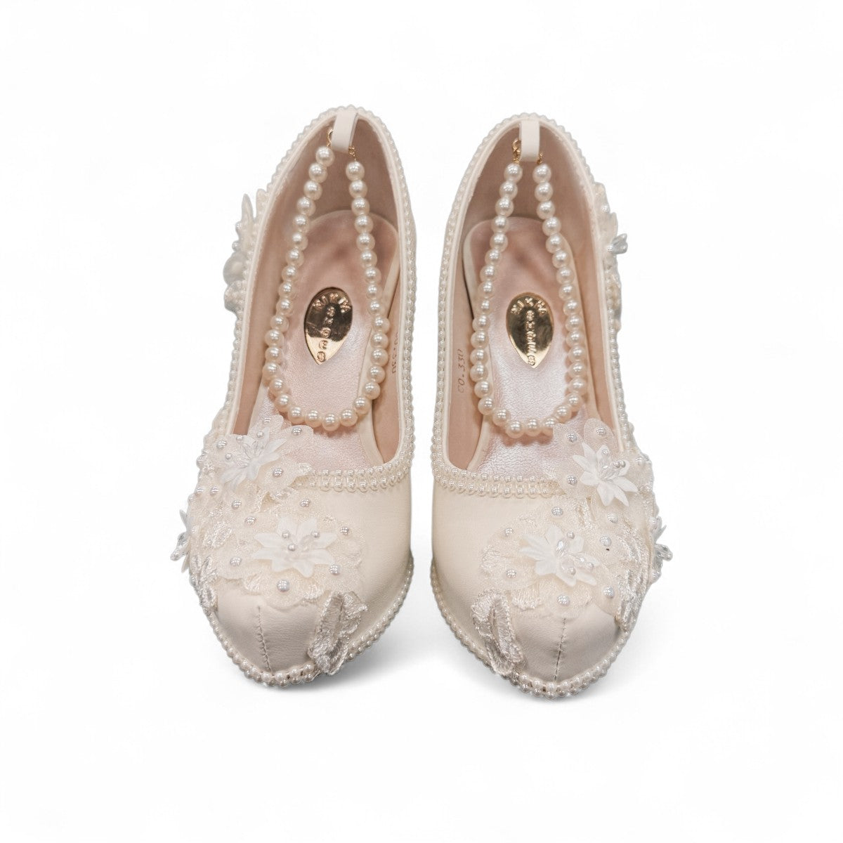 NIKPA FOXY white bridal block heel shoe with handmade floral lace, pearl embellishments, and platform.