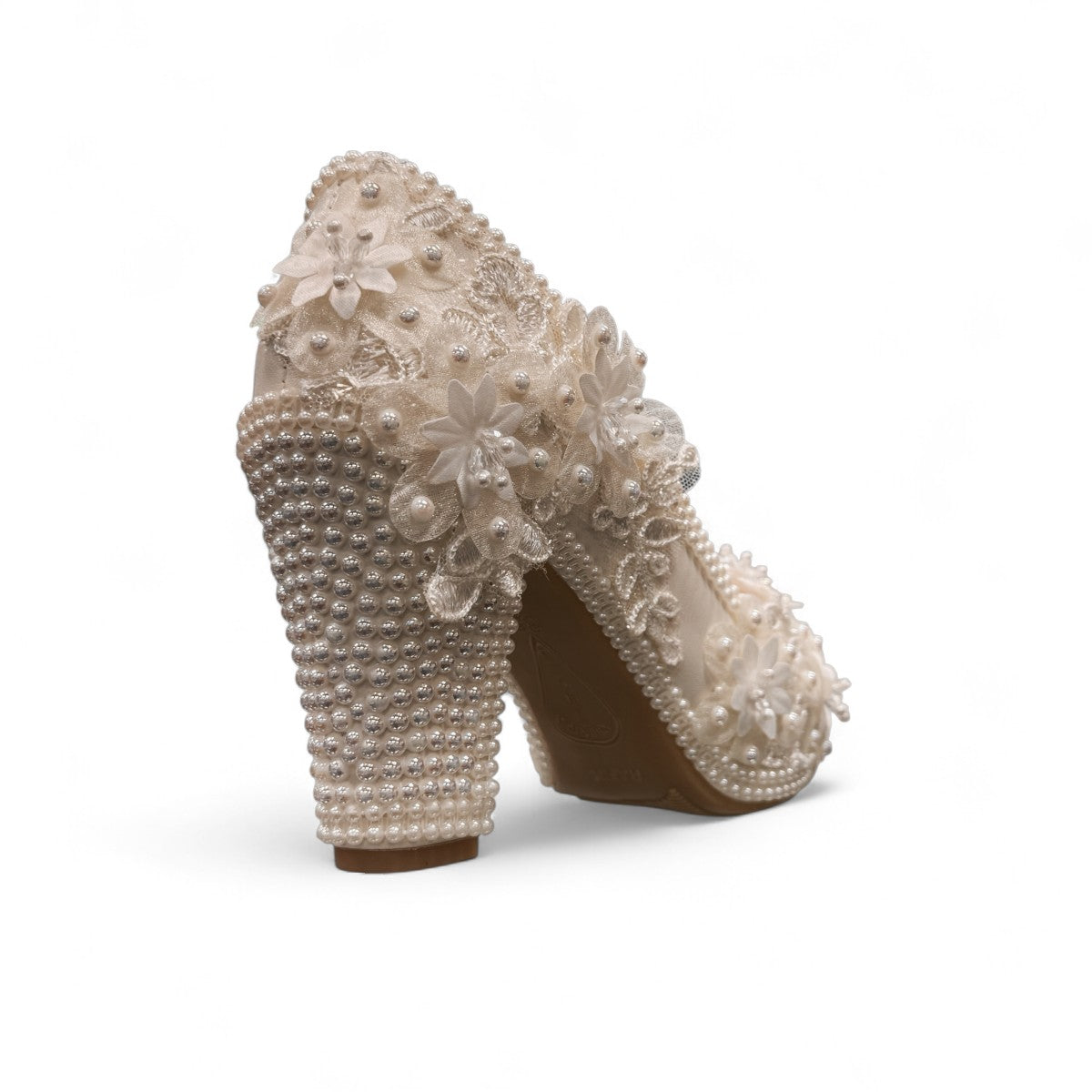 NIKPA FOXY white bridal block heel shoe with handmade floral lace, pearl embellishments, and platform.