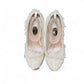 NIKPA FOXY white bridal block heel shoe with handmade floral lace, pearl embellishments, and platform.
