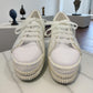 Nikpa Sofi white bridal platform sneaker with pearl and rhinestone embellishments on a thick sole