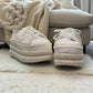 Nikpa Sofi white bridal platform sneaker with pearl and rhinestone embellishments on a thick sole