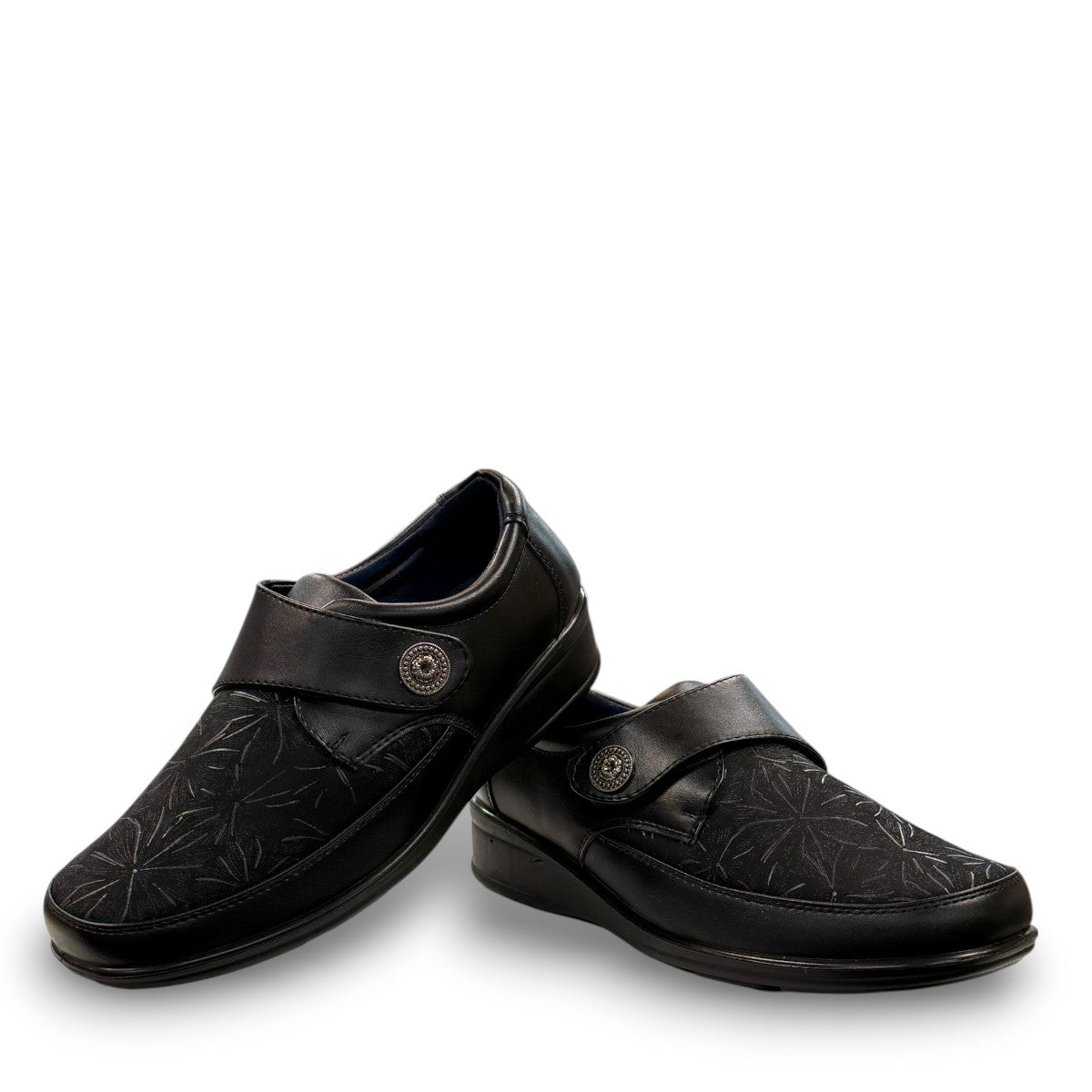ORTHO FLEX F8244 black comfort shoe with adjustable strap, textured accents, and cushioned sole.
photo of the front side