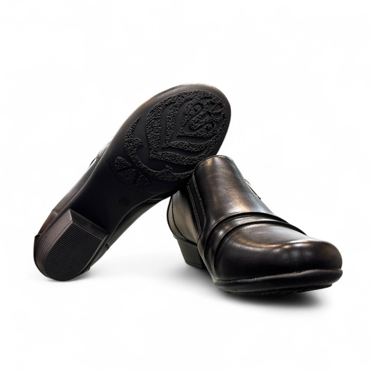 Ortho Flex black low-cut dress shoe with side zipper detail and a short block heel.
photo of the bottom side