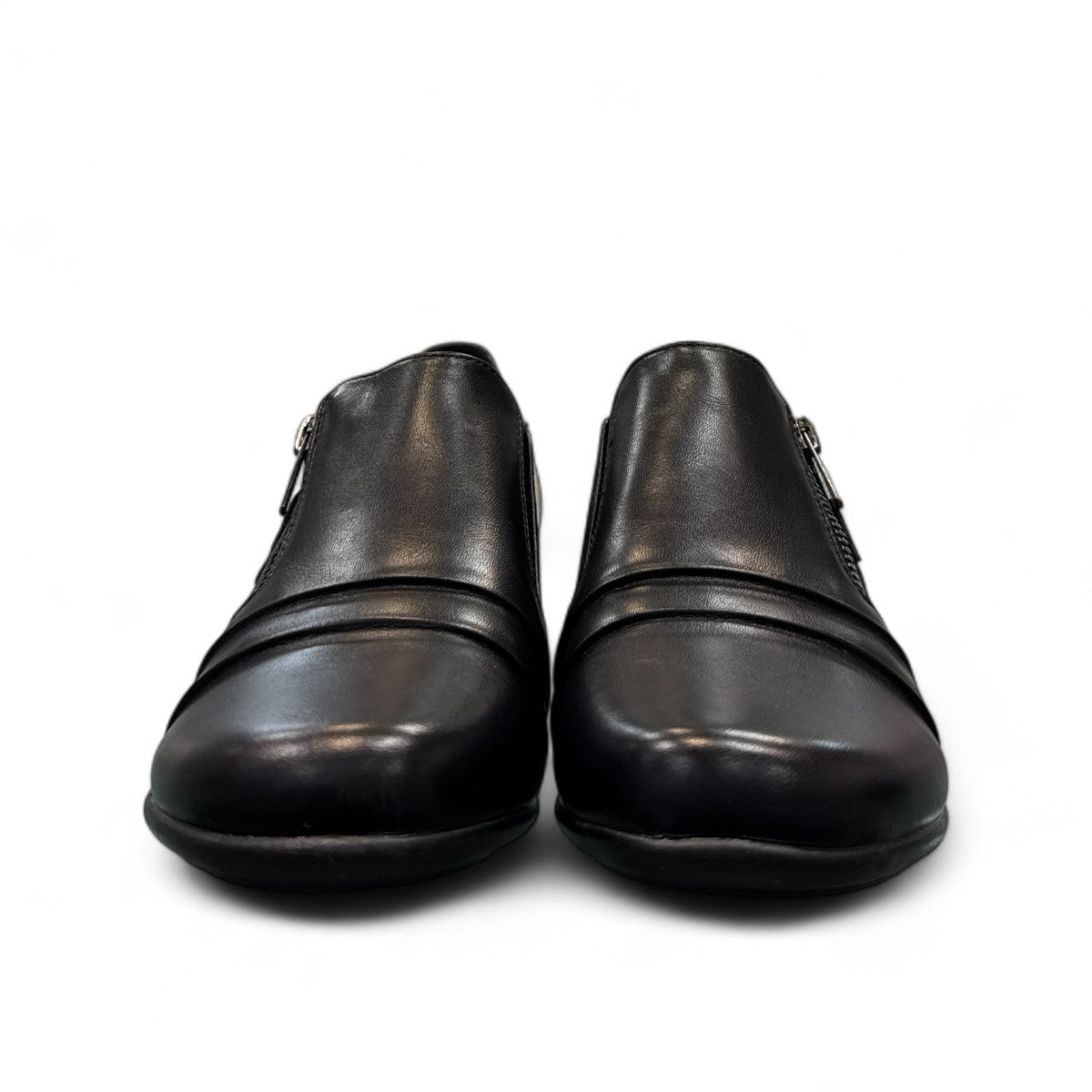 Ortho Flex black low-cut dress shoe with side zipper detail and a short block heel.
photo of the front side