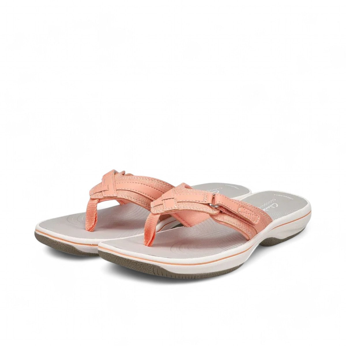 Sina Footwear peach Clarks Breeze Sea flip-flops with adjustable strap closure and lightweight cushioned sole. Photo of both from an angle.
