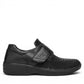 Propet Bianca black leather orthotic shoe with a single hook and loop strap and textured toe detail.
photo of the right side
