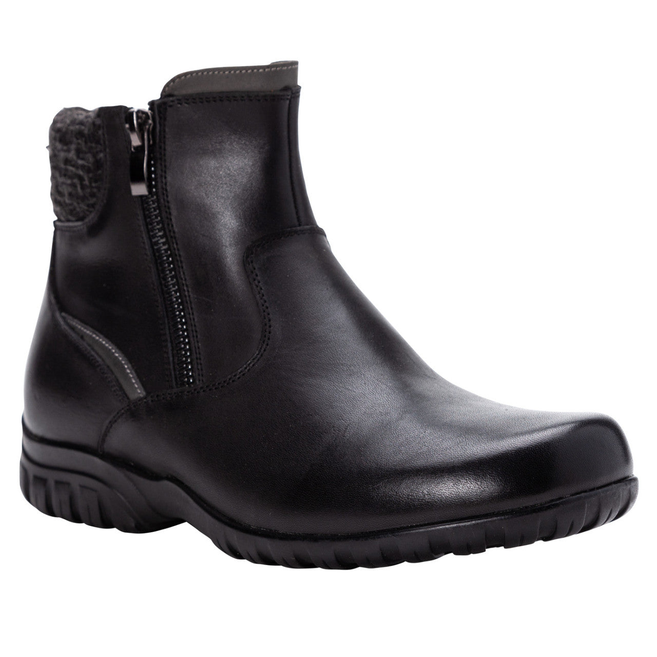 Propet Darley black leather ankle bootie with twin zips, knit collar, and rubber outsole.
photo of the front side