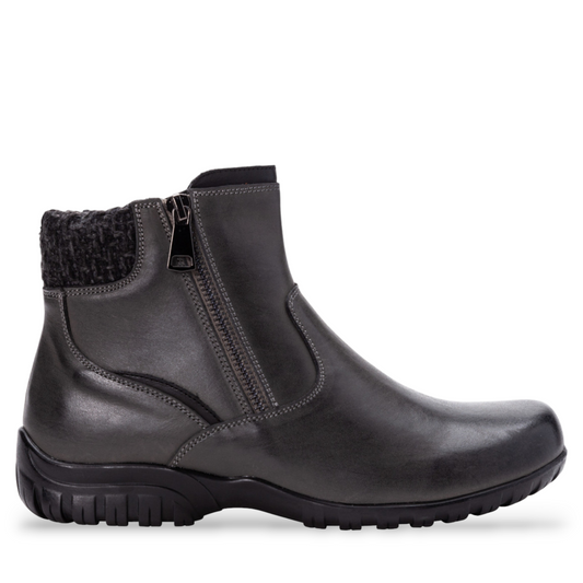 Propet Darley black leather ankle bootie with twin zips, knit collar, and rubber outsole.
photo of the right side