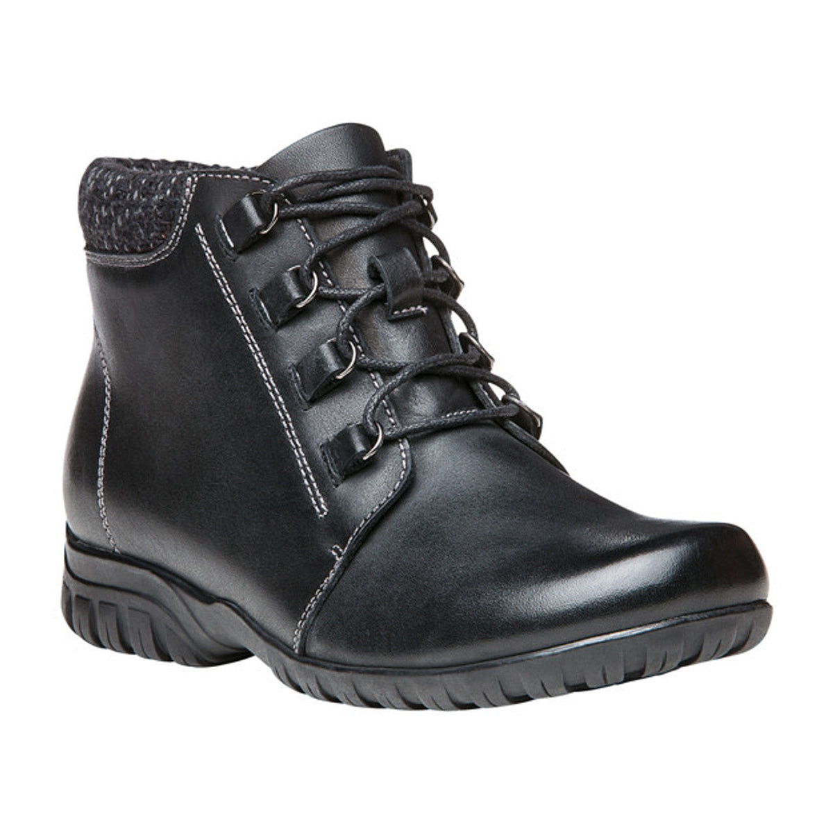 Propet Delaney black leather ankle bootie with D-ring lacing, side zip, and textured knit collar.
photo of the front side