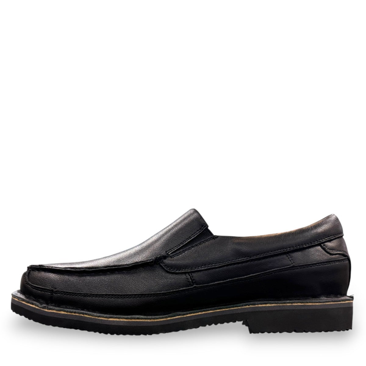 Propet Flynn black leather slip-on shoe with twin gore panels and a durable rubber outsole.
photo of the left side