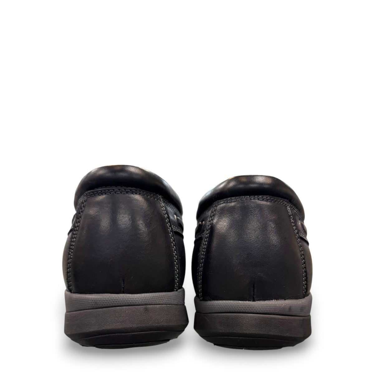 Propet Pomeroy black leather boat shoe with lace-up closure and supportive EVA midsole.
photo of the back side
