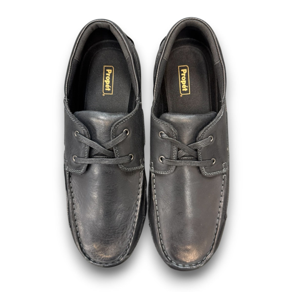 Propet Pomeroy black leather boat shoe with lace-up closure and supportive EVA midsole.
photo of the top side