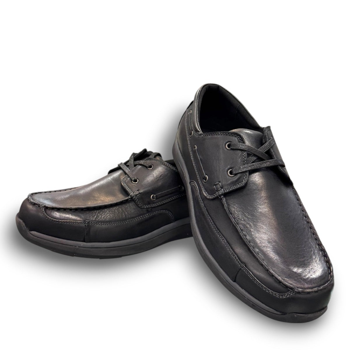 Propet Pomeroy black leather boat shoe with lace-up closure and supportive EVA midsole.
photo of the front side
