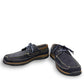Propet Pomeroy navy suede boat shoe with lace closure, contrast stitching, and cushioned EVA midsole.
photo of the  front side