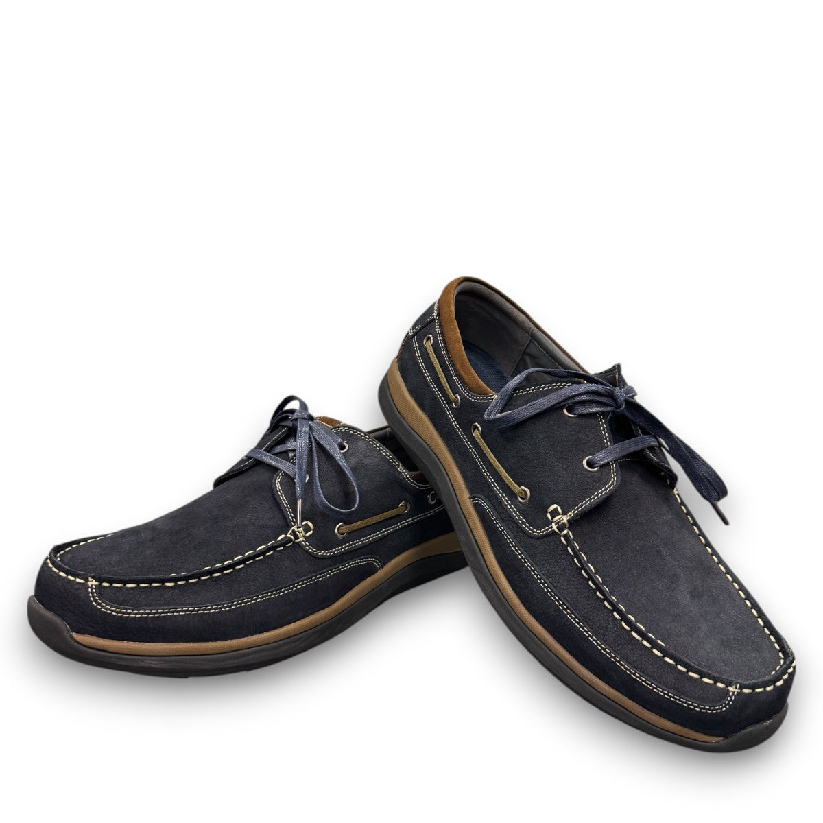 Propet Pomeroy navy suede boat shoe with lace closure, contrast stitching, and cushioned EVA midsole.
photo of the front side