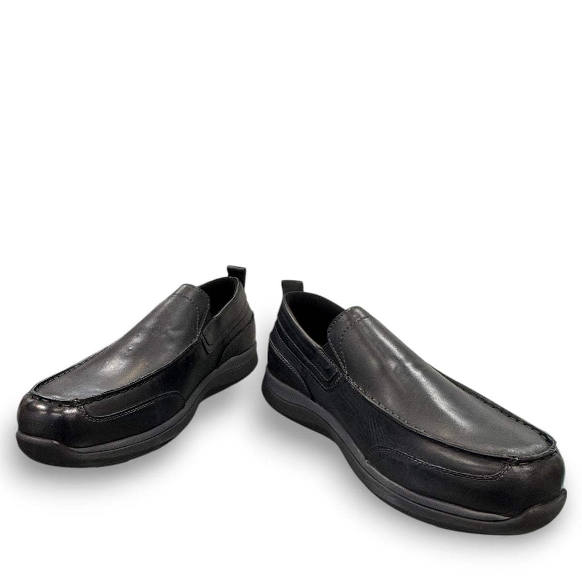 Propet Preston black leather slip-on boat shoe with twin gores and a flexible EVA outsole.
photo of the front side