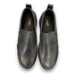 Propet Preston black leather slip-on boat shoe with twin gores and a flexible EVA outsole.
photo of the top side