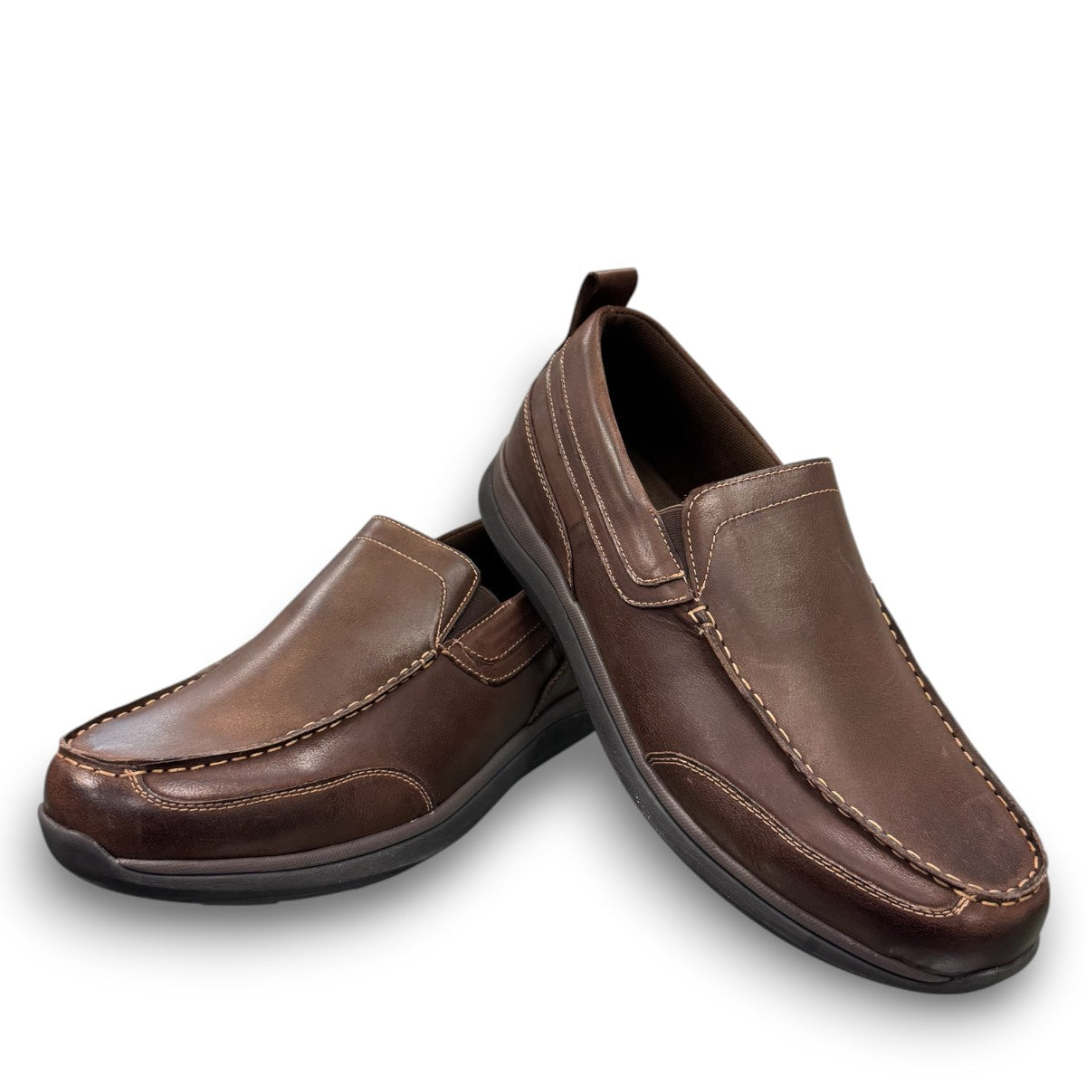 Propet Preston coffee brown leather slip-on boat shoe with twin gore detailing and flexible EVA outsole.
photo of the front side