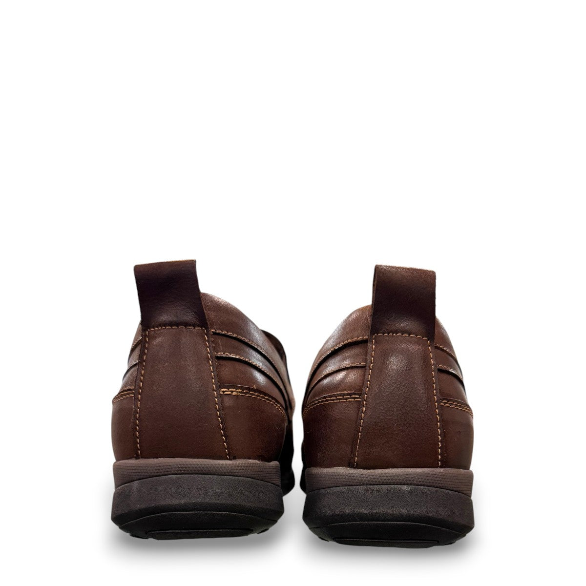 Propet Preston coffee brown leather slip-on boat shoe with twin gore detailing and flexible EVA outsole.
photo of the back side