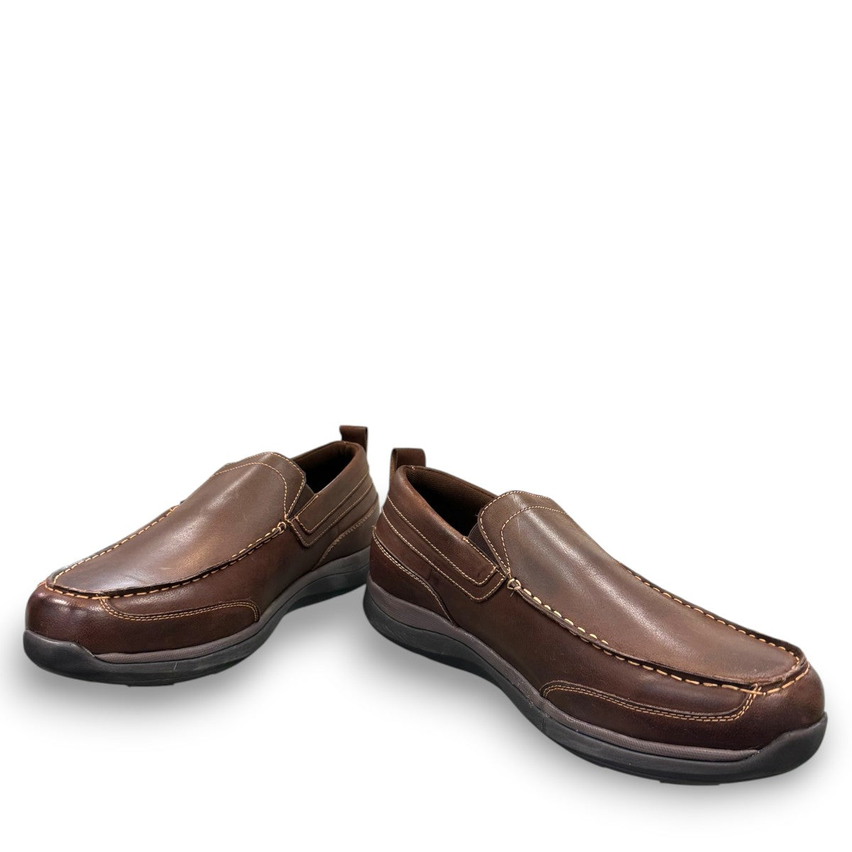 Propet Preston coffee brown leather slip-on boat shoe with twin gore detailing and flexible EVA outsole.
photo of the front side