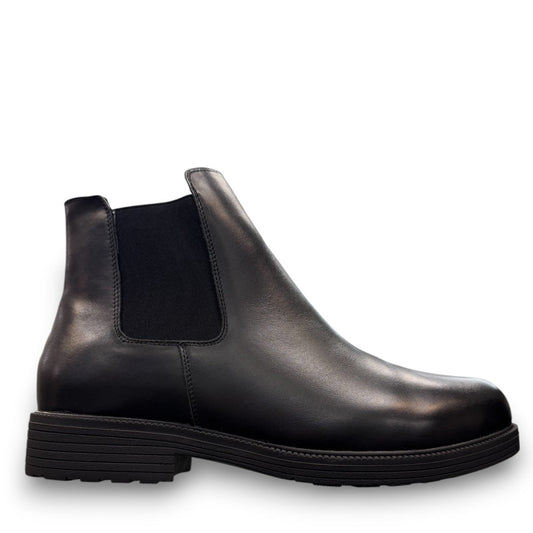 Propet Truman black leather Chelsea boot with elastic side panel and durable lugged TPR outsole.
photo of the right side