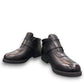 Propet Tyler black leather waterproof boot with hook and loop strap and rugged TPR outsole.
photo of the front side
