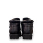 Propet Tyler black leather waterproof boot with hook and loop strap and rugged TPR outsole.
photo of the back side