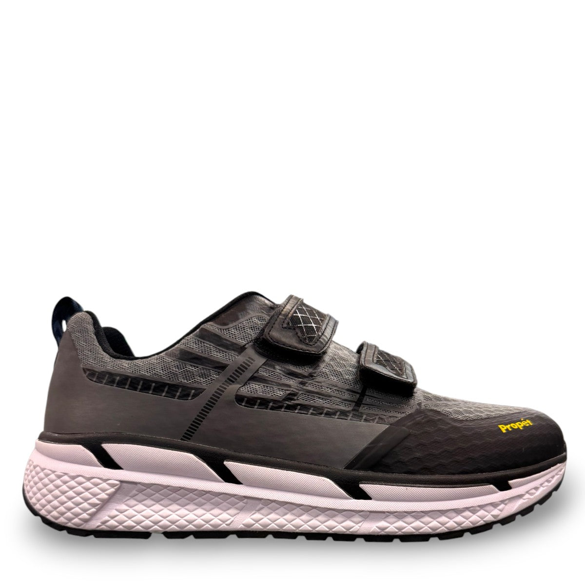 Propet Ultra Strap grey and black athletic shoe with double hook-and-loop closure and knit mesh upper.
photo of the right side