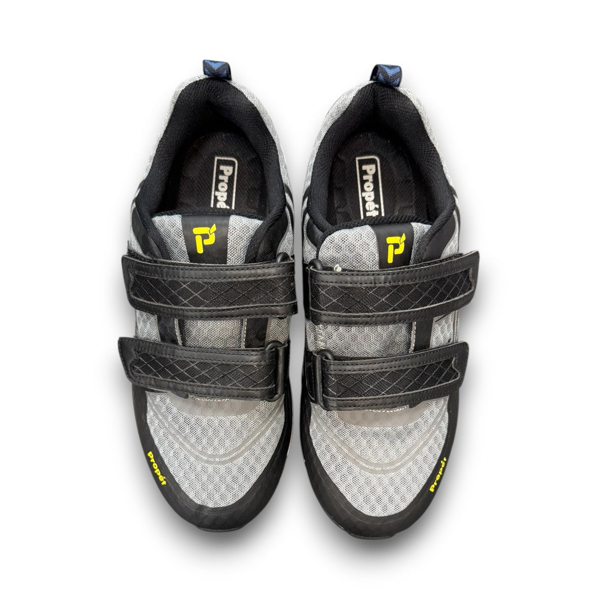 Propet Ultra Strap grey and black athletic shoe with double hook-and-loop closure and knit mesh upper.
photo of the top side