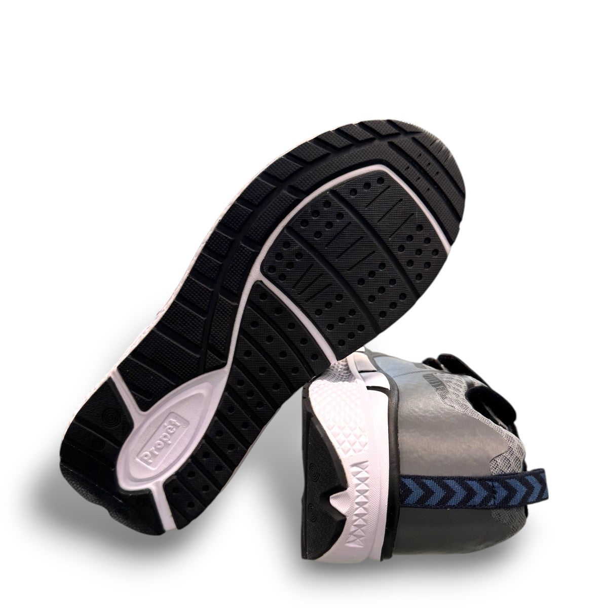 Propet Ultra Strap grey and black athletic shoe with double hook-and-loop closure and knit mesh upper.
photo of the bottom side