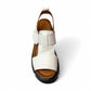 roamers white leather platform sandals with adjustable straps and a chunky black treaded sole.
photo of the top side