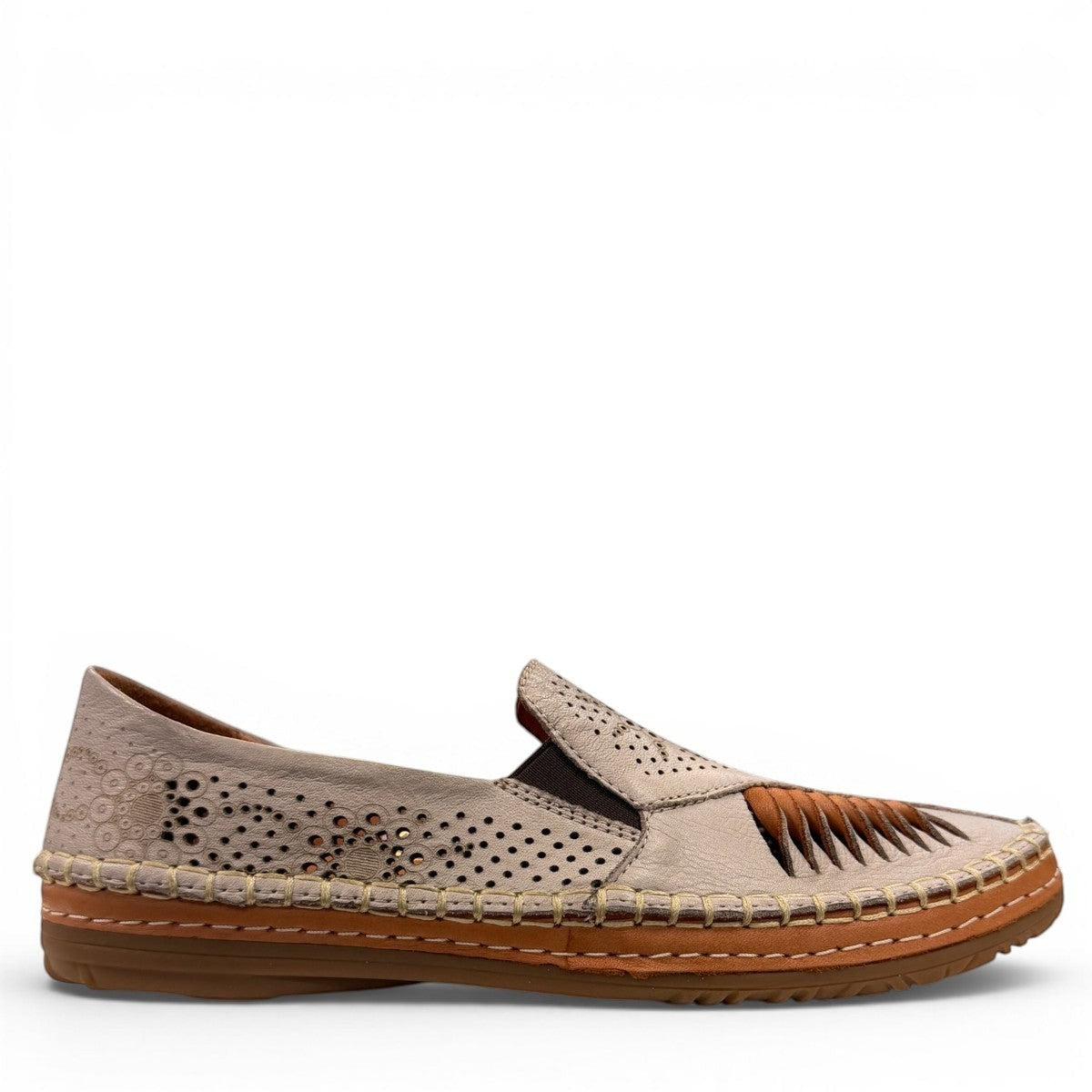 Roamers Atzi silver grey leather flat with intricate cutout details and a comfortable rubber sole.
photo of the right side