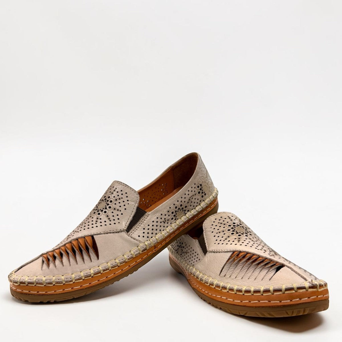 Roamers Atzi silver grey leather flat with intricate cutout details and a comfortable rubber sole.
photo of the front side